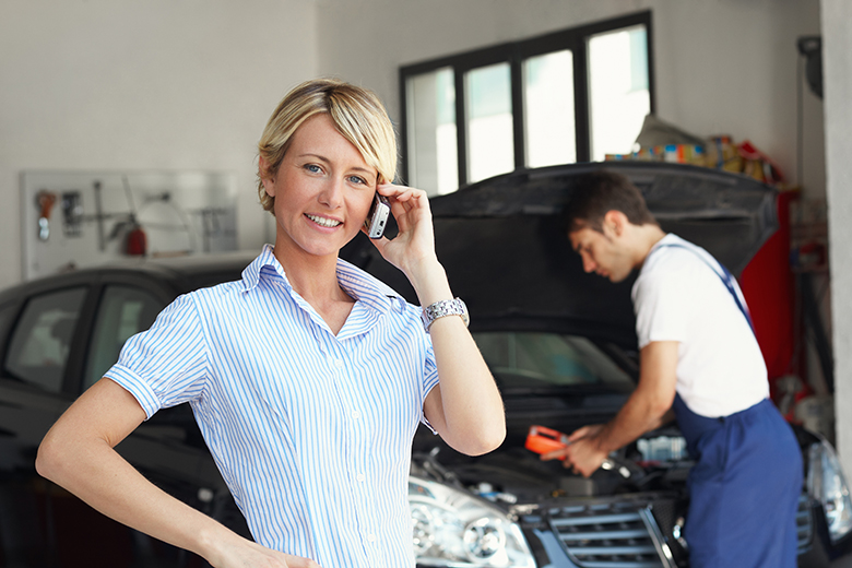 Woman on Phone in garage